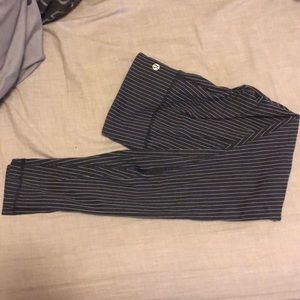 Navy Lululemon leggings with white stripes